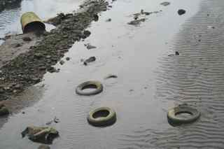 Contaminated River with Tires